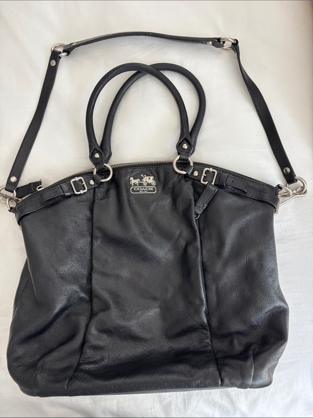 Coach Black Leather shoulder/carry bag with silver buckles. Silky magenta lining
